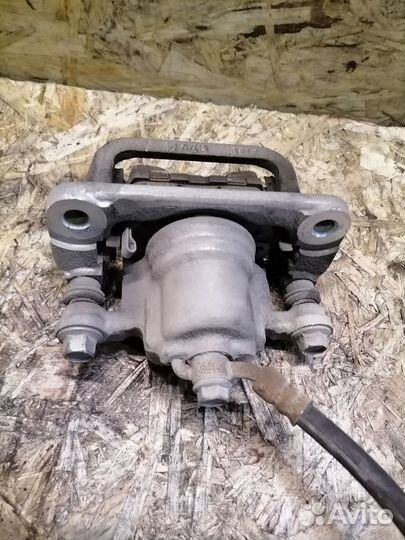 Суппорт тормозной задний Nissan Teana J32 4WD