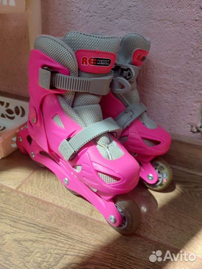 Роликовые коньки