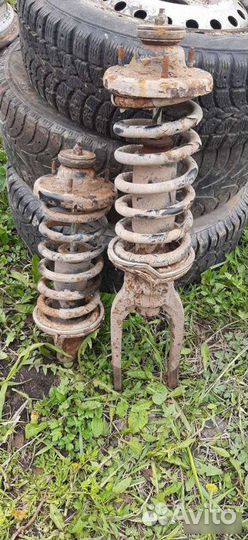 Стойки передние Kia Sportage