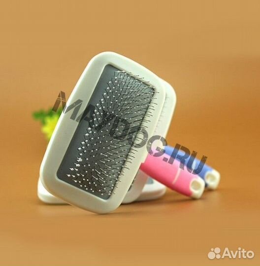 Пуходерка-щетка для вычесывания кошек и собак