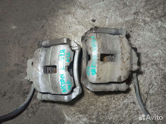 Суппорт передний левый, правый Nissan Almera N16