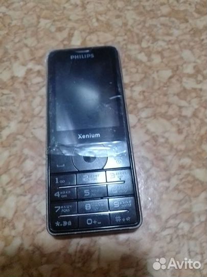 Телефон Philips X1560