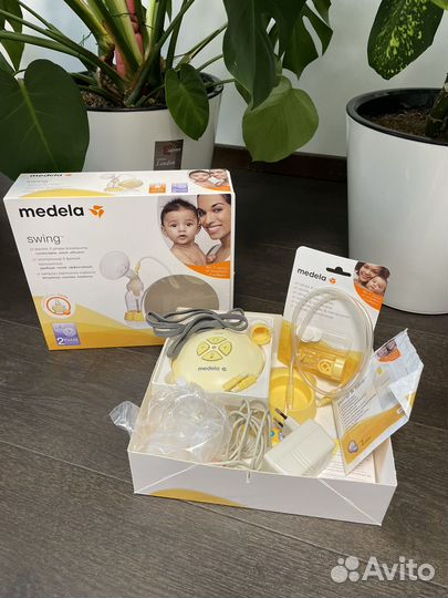 Молокоотсос Medela