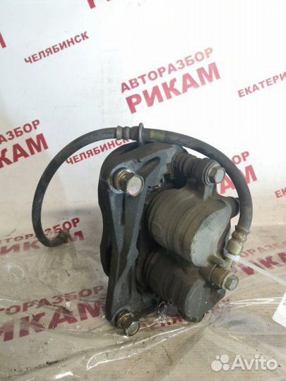 Суппорт тормозной передний правый Subaru Forester