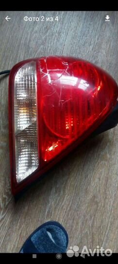 Фонарь задний левый ниссан bluebird sylphu 2003 г