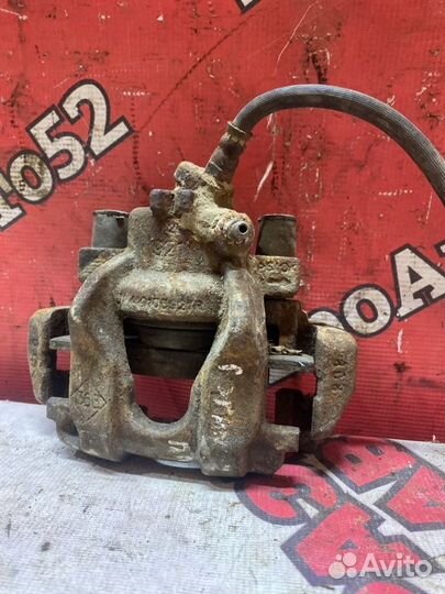 Суппорт тормозной передний левый Renault Logan 2