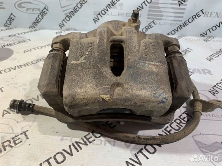 Суппорт тормозной передний левый Kia Ceed 1 ED