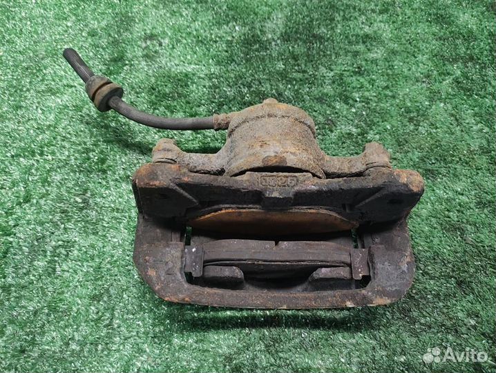 Суппорт тормозной передний левый Chevrolet Spark