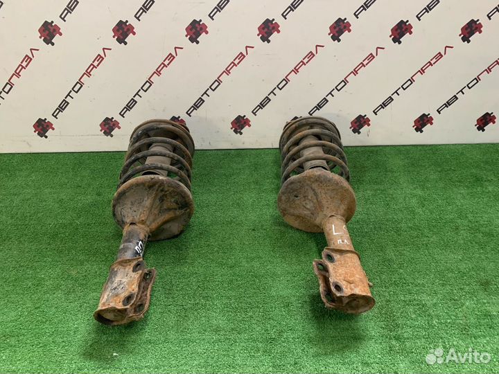 Амортизатор стойка лев прав Mitsubishi Lancer 9