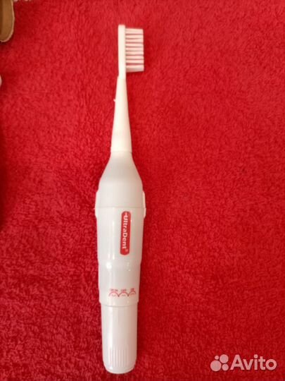 Новая электрическая зубная щётка и ролики