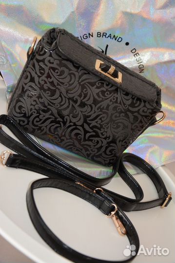 Маленькая чёрная сумочка клатч