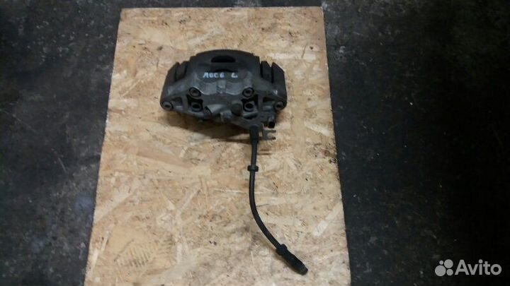 Суппорт тормозной передний левый Audi Alroad A6 C6