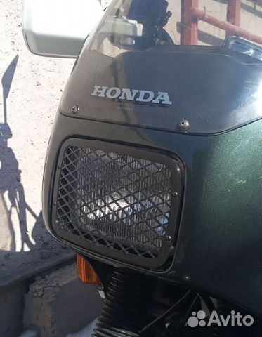 Решетка на фару Honda Transalp