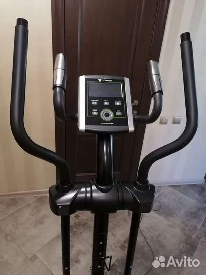 Эллиптический тренажер torneo