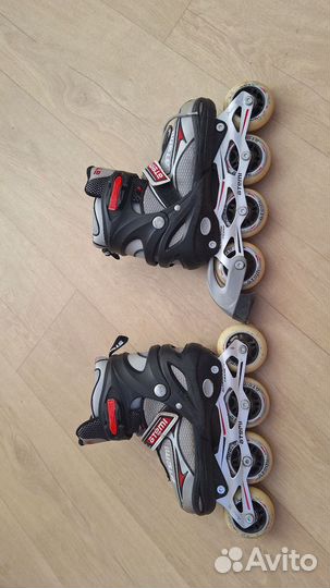 Роликовые коньки