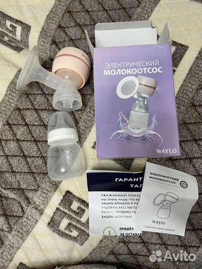 Электрический молокоотсос