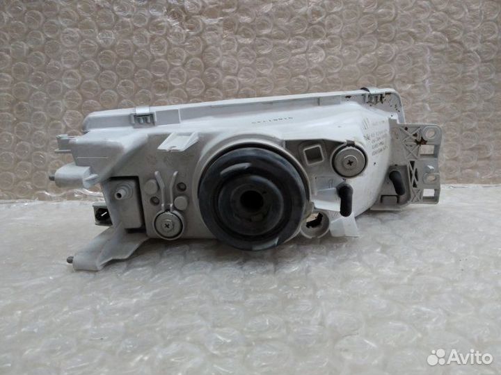 Фара левая Mitsubishi Lancer 1998-2000