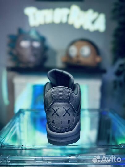 Кроссовки nike air jordan 4 kaws серые