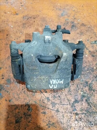 Суппорт тормозной передний левый Opel Mokka