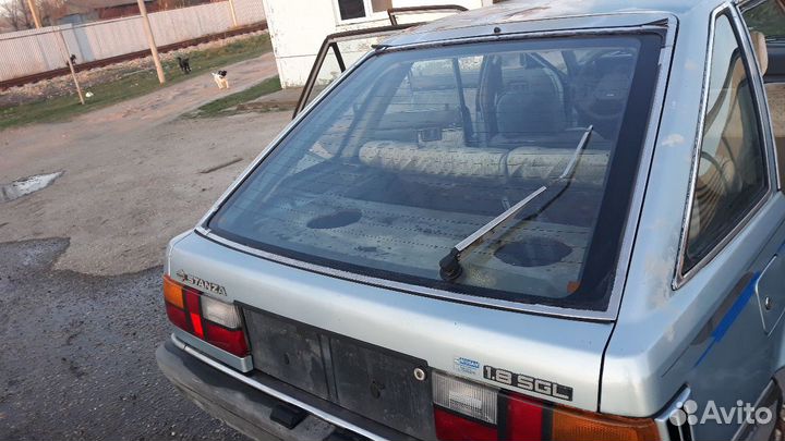 Крышка багажника nissan stanza