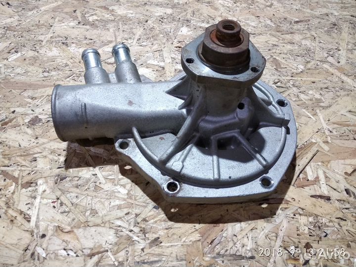 Помпа на опель омега двигатель 2.6л