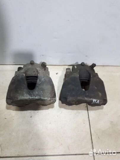 Суппорт передний левый Opel Astra H 2004-2014