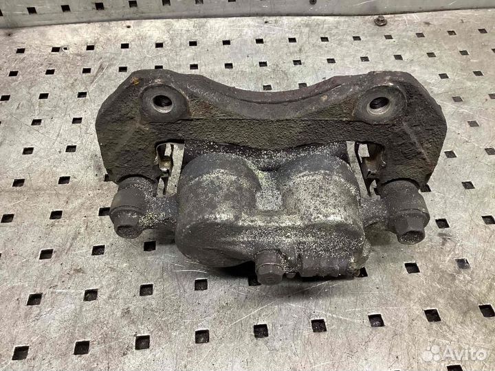 Суппорт передний левый Mitsubishi Outlander