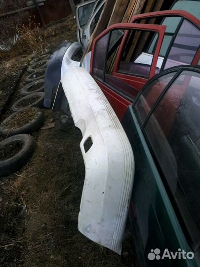 Задний бампер Nissan Sunny b13