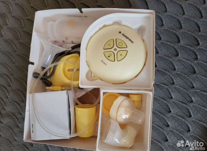 Молокоотсос medela электрический