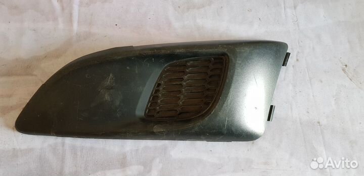 Chevrolet Aveo T300 Заглушка птф левая