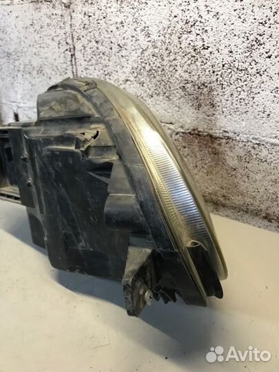 Фара левая Nissan March 3 AK12