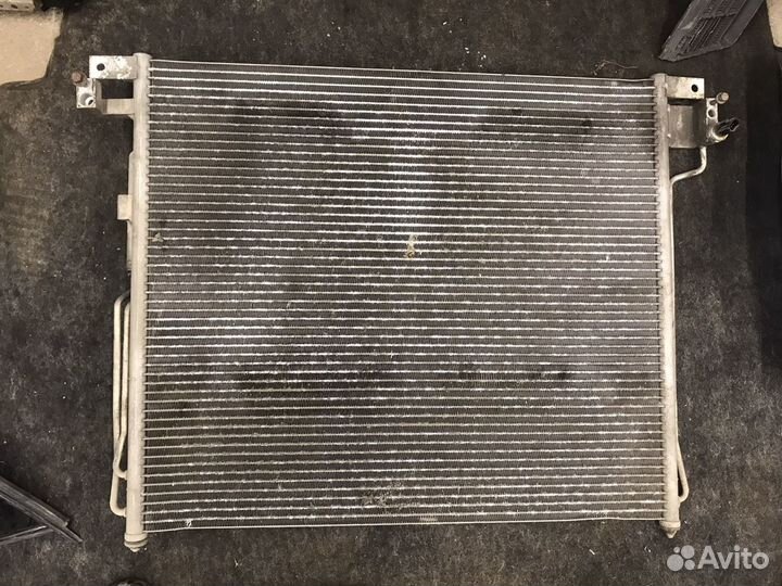 Радиатор кондиционера Ниссан Навара д40 2008 год