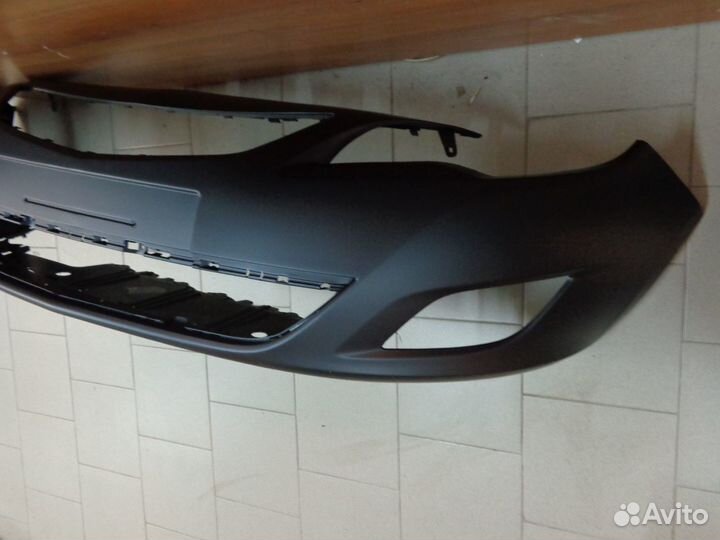 Opel Astra J 09- Бампер передний новый не оригинал