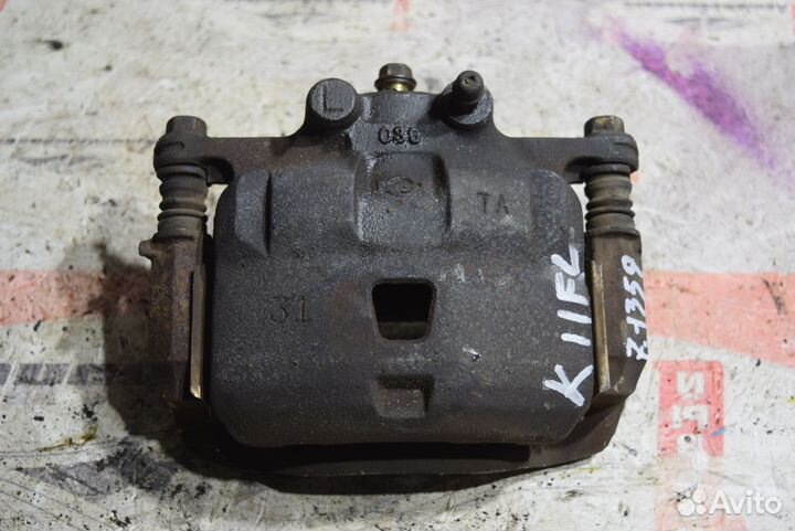 Суппорт перед лево c Nissan Wingroad WFY11 QG15DE