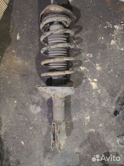 Стойка амортизатора передняя правая Chery Very A13