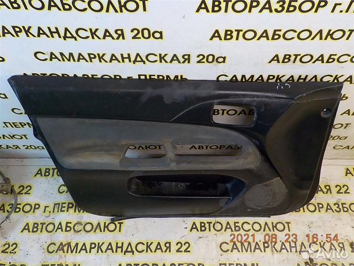 Обшивка двери передней левой Mitsubishi Lancer 9
