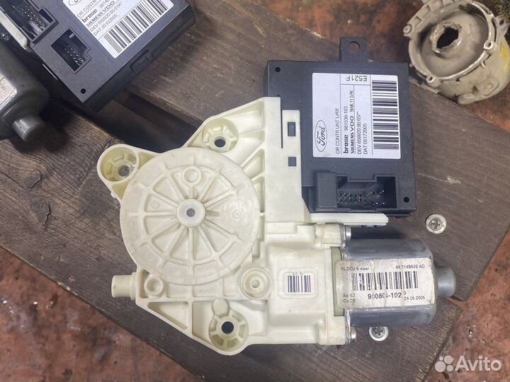 Фокус 2 моторчик стеклоподьемника задний левый