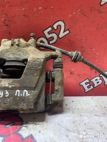 Суппорт тормозной передний левый Chevrolet Cruze 1