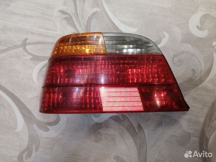 Фонарь задний левый Бмв е38