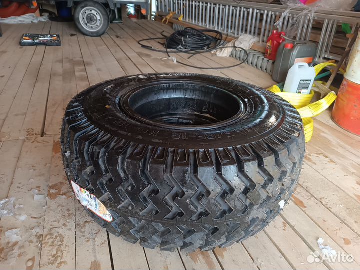 Шина кф-105А 15.5/65 R18