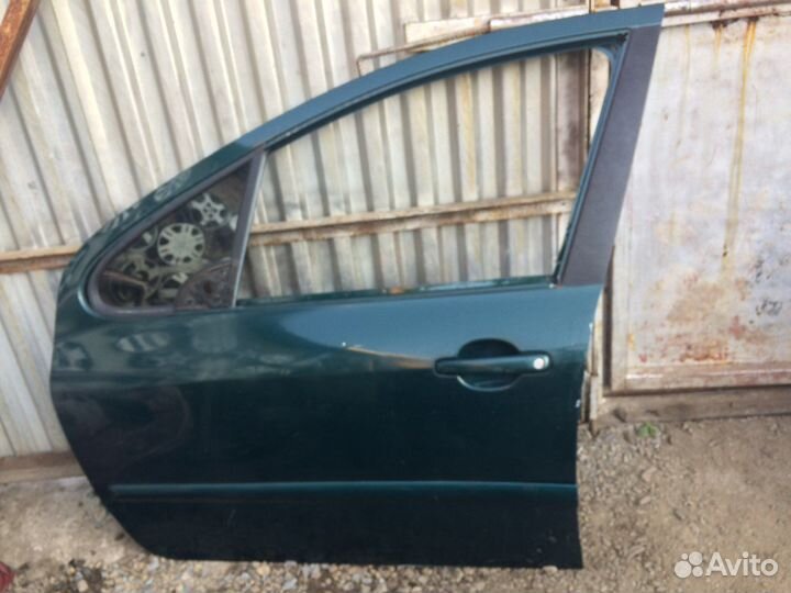 Дверь передняя левая Peugeot 307
