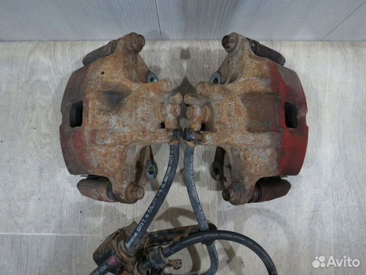 Суппорт передний левый Mitsubishi Lancer 10