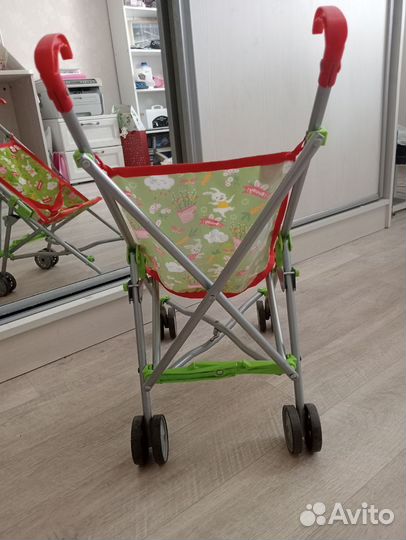 Детская игрушечная коляска