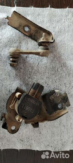 Тяга и сам датчик кор.фар Honda 06136-SWA-R01