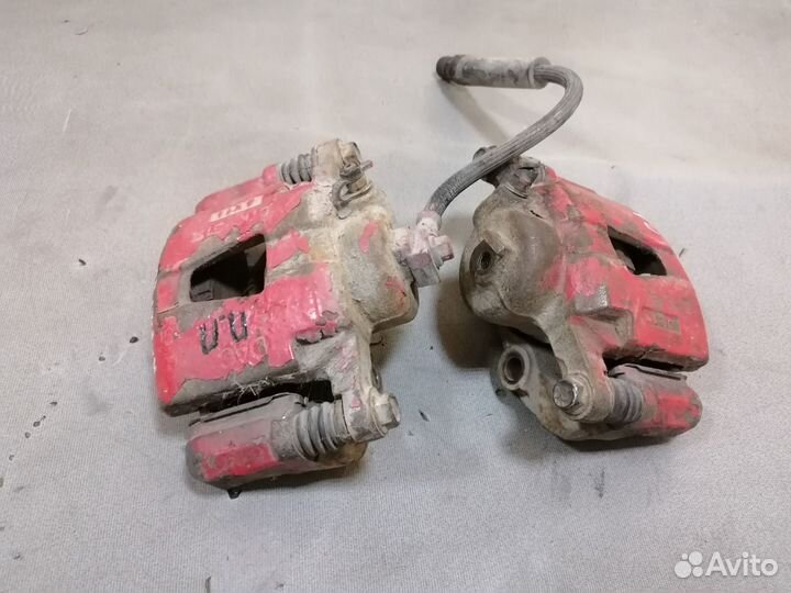 Суппорт тормозной передний Opel Kadett E1984-1992