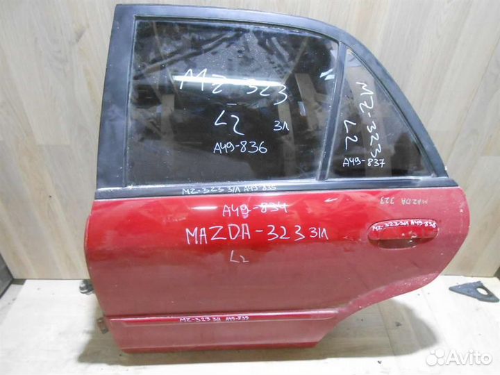 Дверь задняя левая Mazda 323 (BJ) 1998-2003
