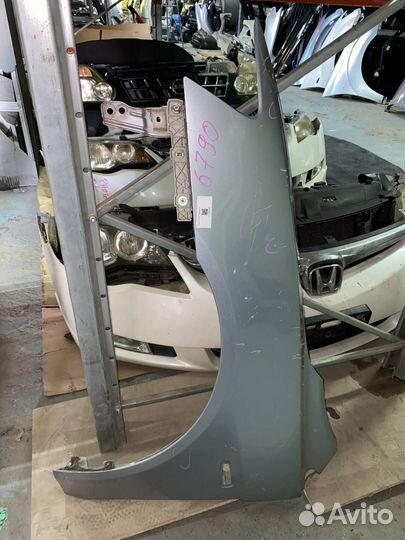 Крыло левое переднее Mitsubishi lancer 10