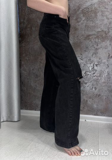 Джинсы с разрезами