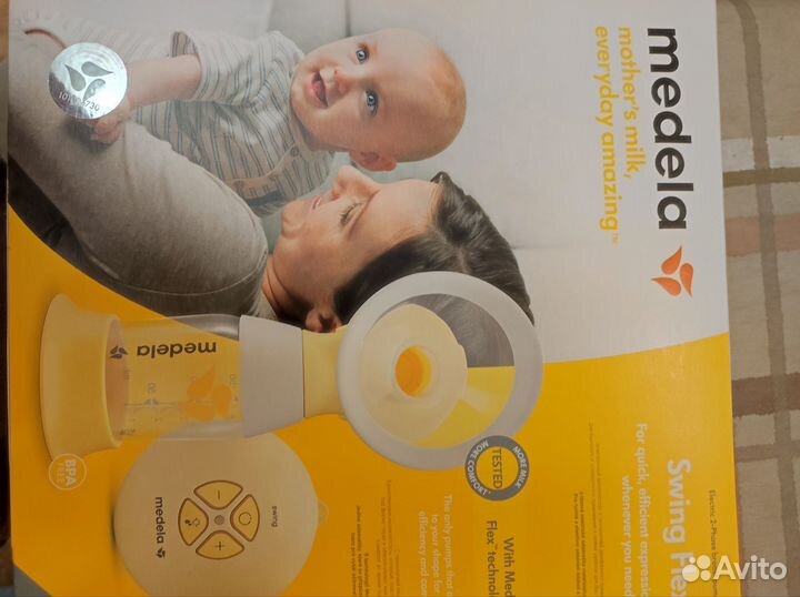 Молокоотсос medela электрический