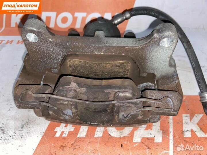 Суппорт тормозной передний правый Volkswagen